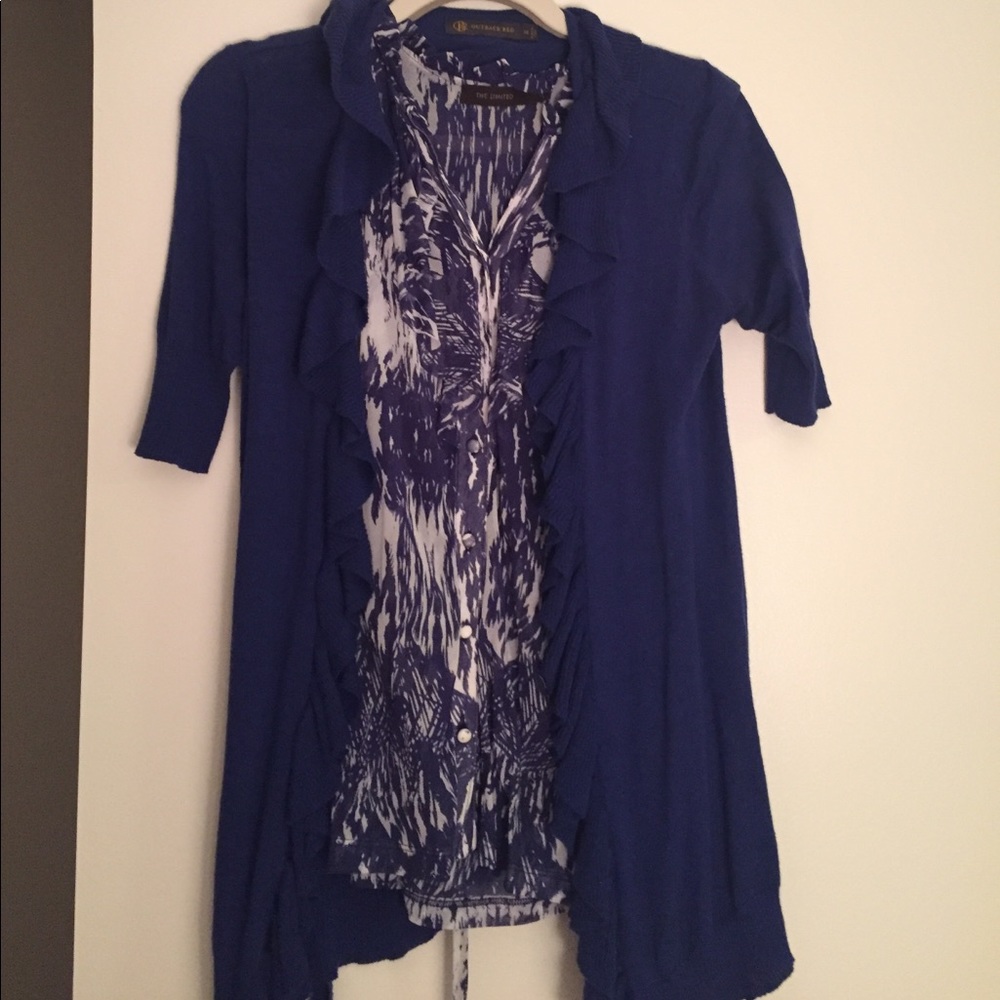 Blue and white sleeveless blouse