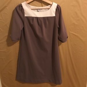 A brown and cream dress