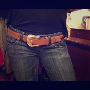 Western belt with silver detail.