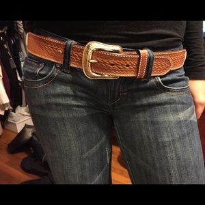 Western belt with silver detail.