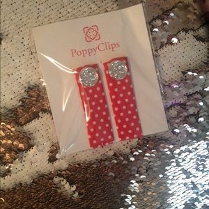 Poppy clip. Red and white polka dots