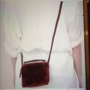 Kara maroon stowaway cross body $290