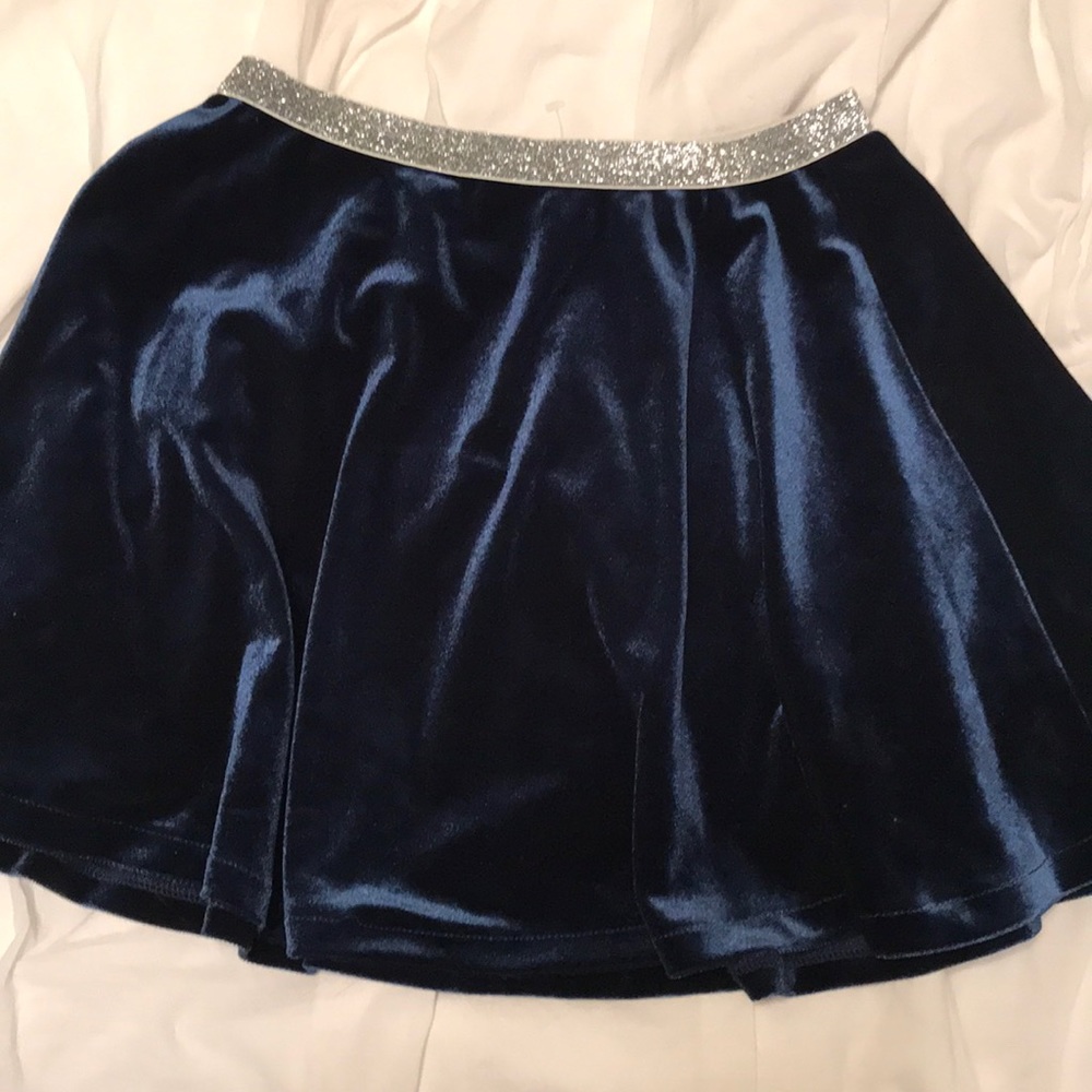 Girls blue velvet skirt.