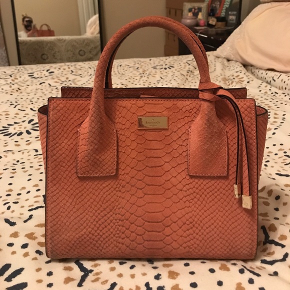 kate spade Handbags - KATE SPADE. Coral pink suede snake skin purse.