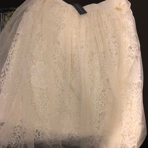 White lace skirt
