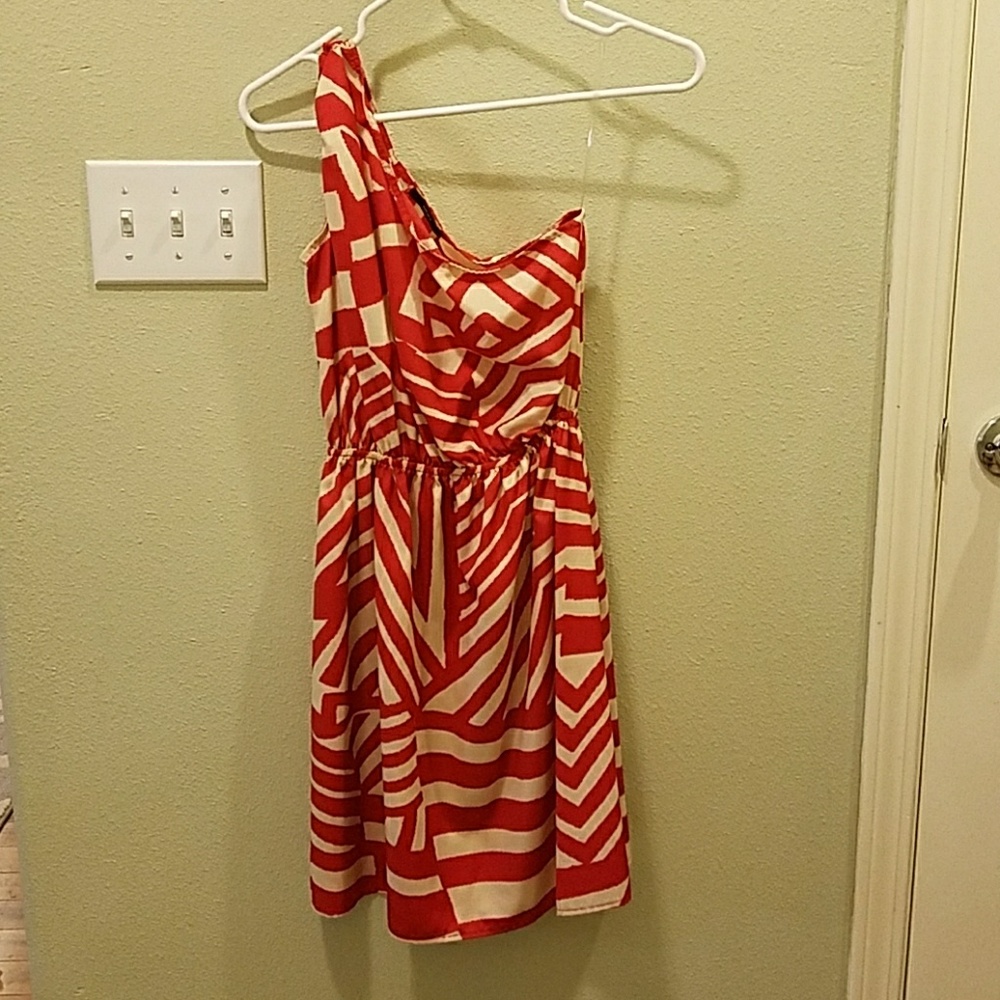 One shoulder dress. Red and cream pattern. Size S