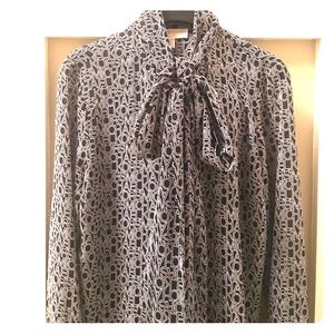 Michael Kors signature look with pussy bow design.