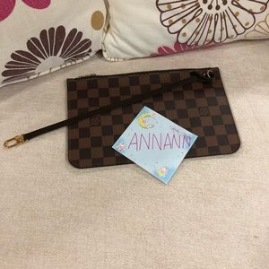 Brand new Neverfull pouch