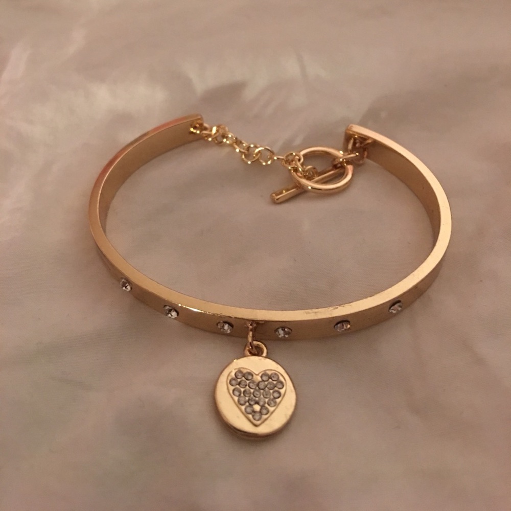 BCBG gold bracelet with heart charm