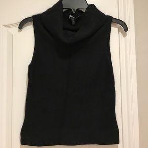 Black cashmere sleeveless turtleneck sweater.