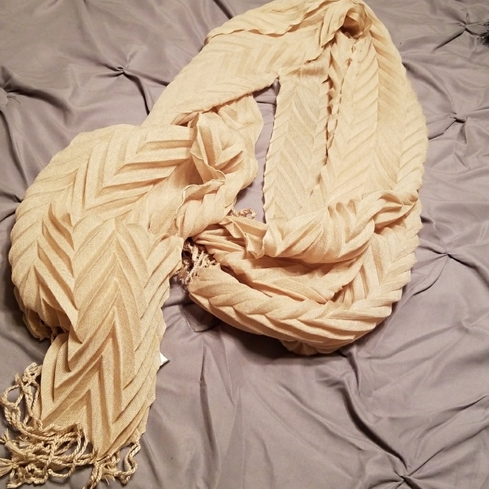 Long lightweight cream colored scarf