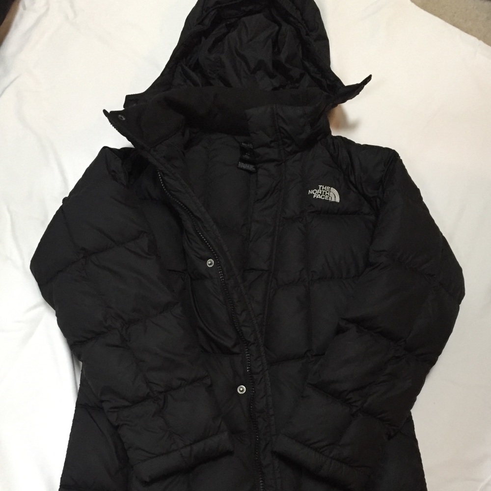 The NORTH FACE hooded puffer jacket.