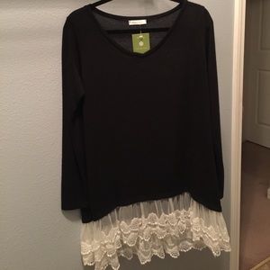 Long sleeve top with white lace on the bottom!