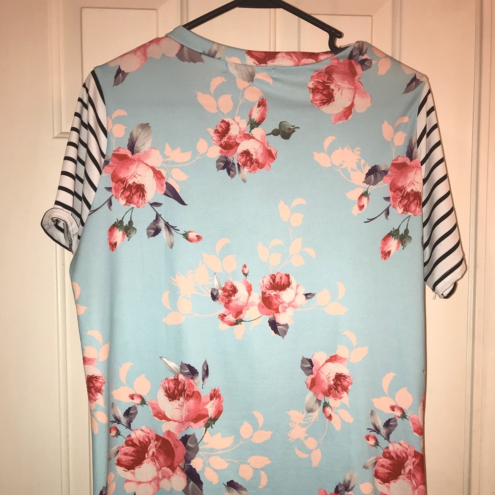 Turquoise floral w/ black & white stripe sleeves. - Picture 2 of 3