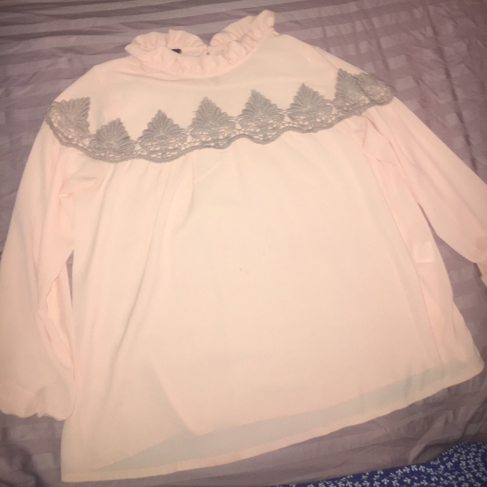 Long sleeve blouse with lace and keyhole design
