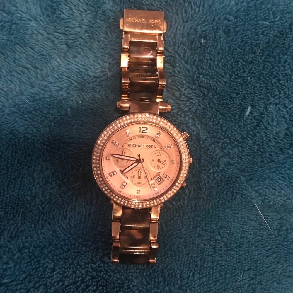 Michael Kors tortoise and gold with crystal bezel