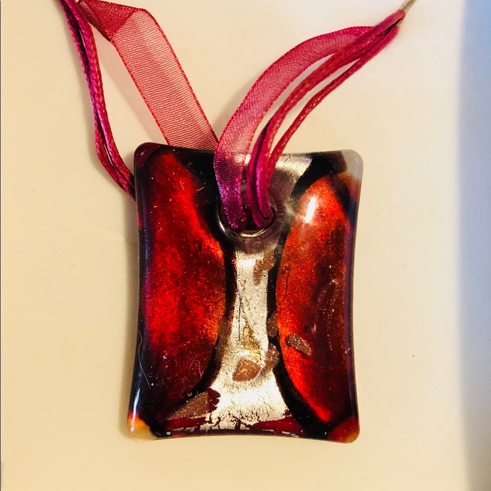 Hand glass blown necklace.