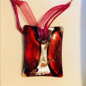 Hand glass blown necklace.