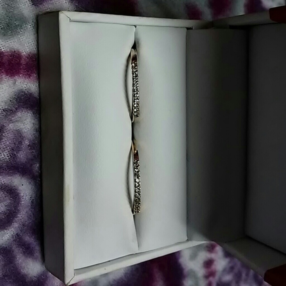 Two rose gold wedding bands.