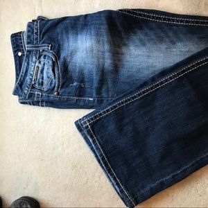 Slightly distress boot cut jeans