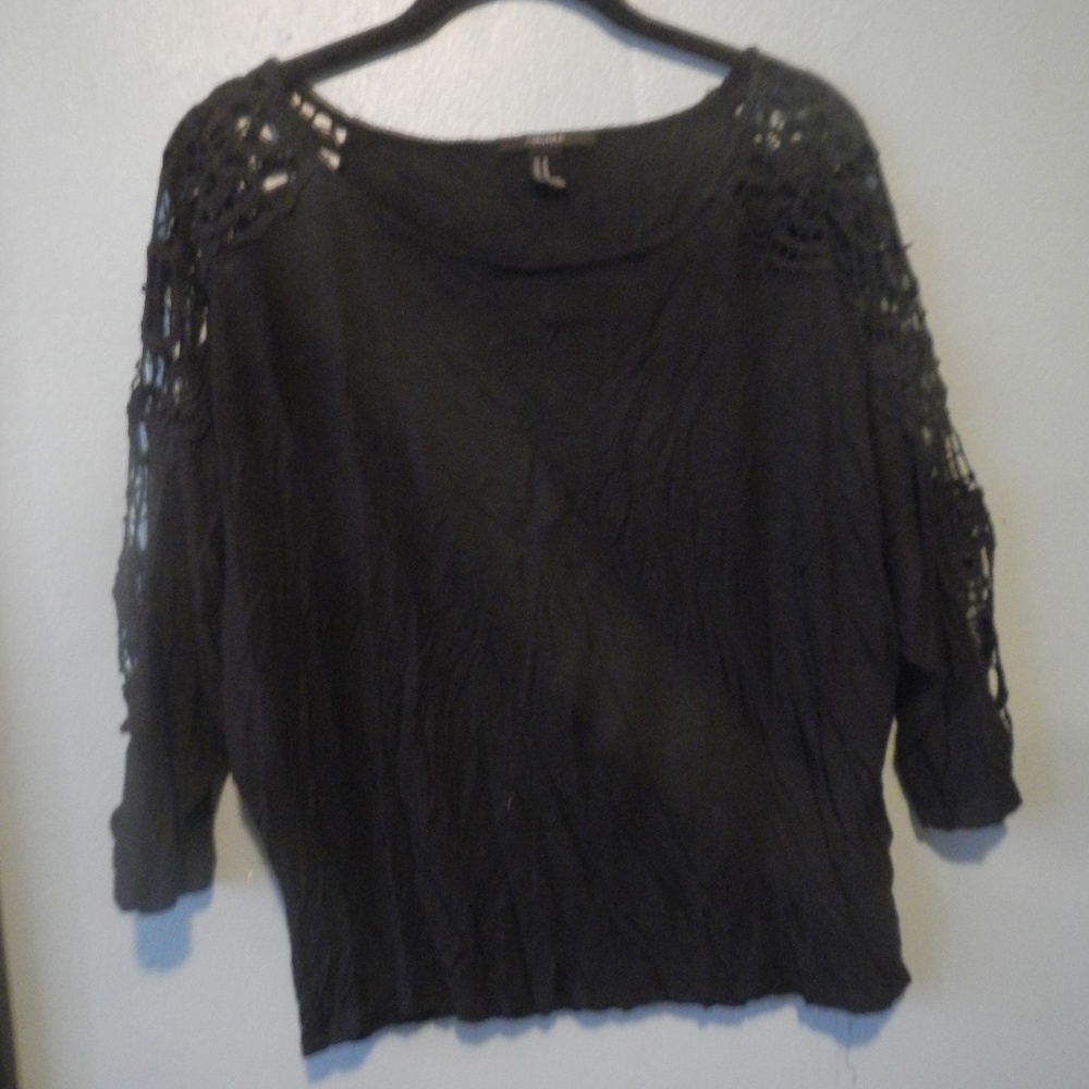 Black top with crotchet sleeve detail