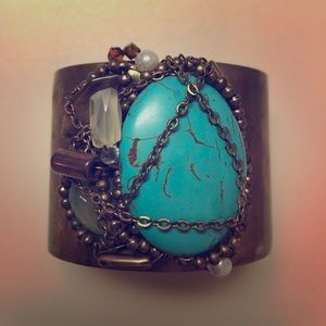 Large stone turquoise bracelet.