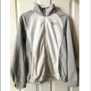 White and grey north face flight series fleece