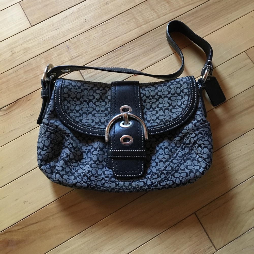 Black and grey Coach purse