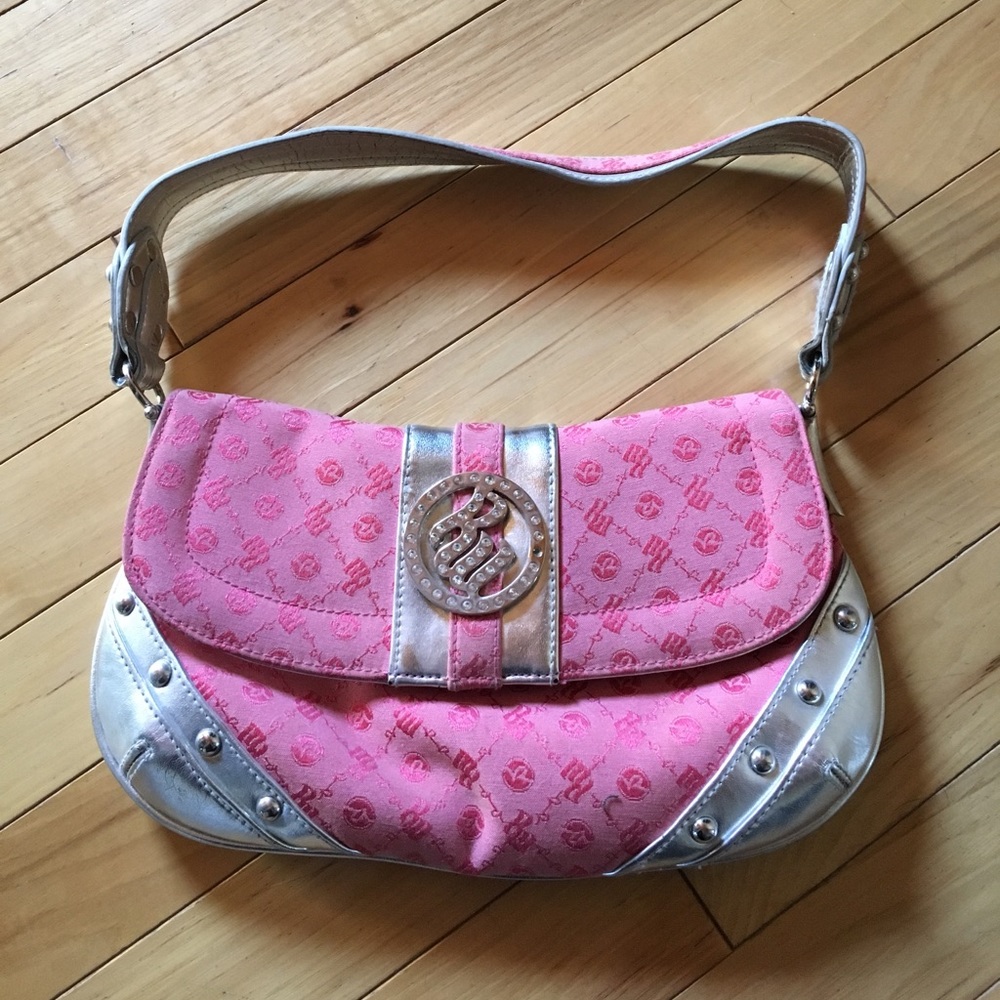 Roca wear pink and silver purse