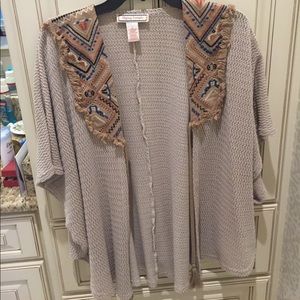 Gently worn and a great top!