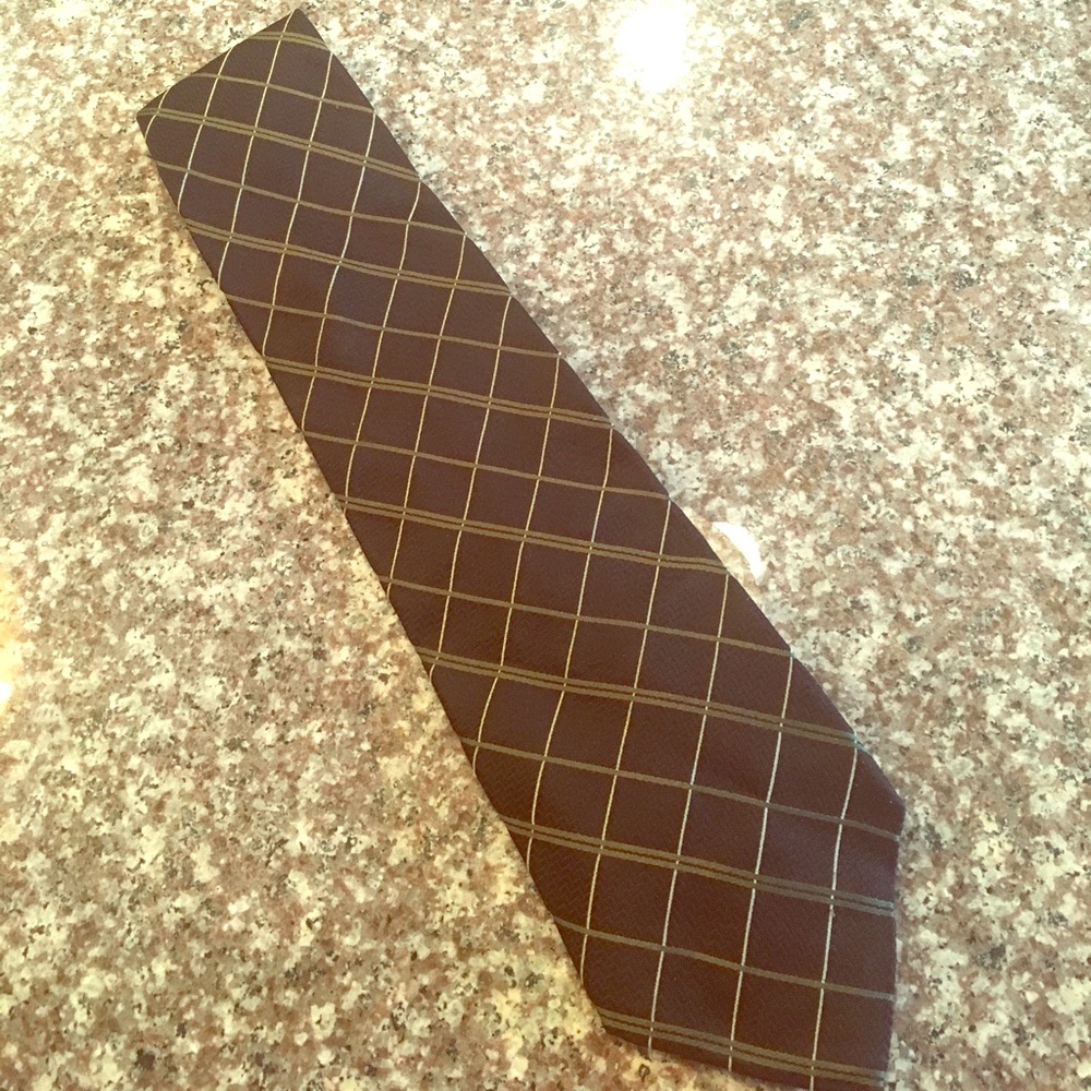 Black tie with green and white stripes