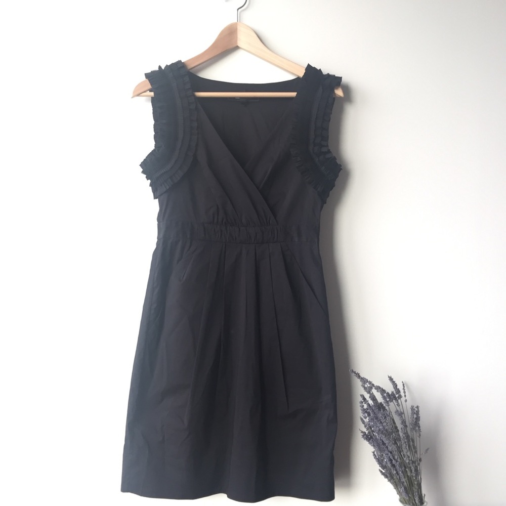 Black dress with ruffle sleeve detail