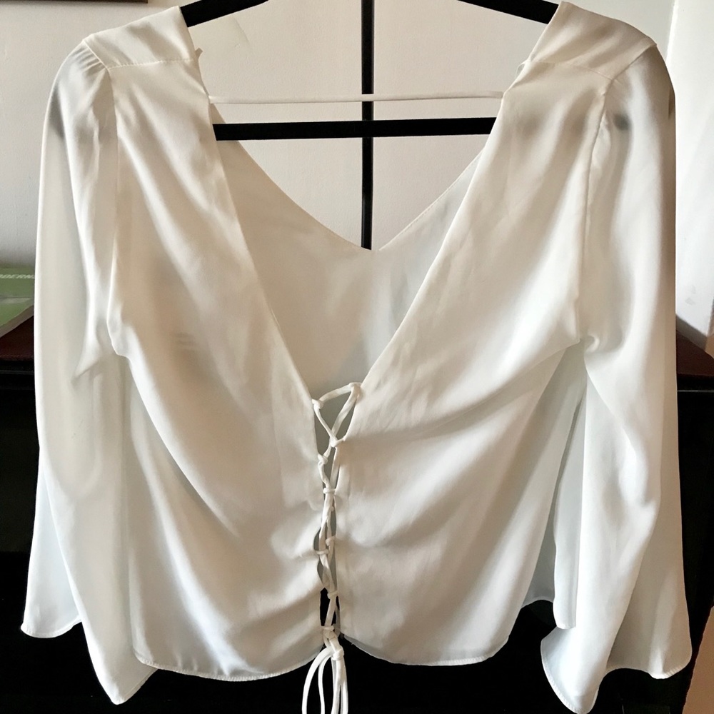 Bell sleeve, tie back top