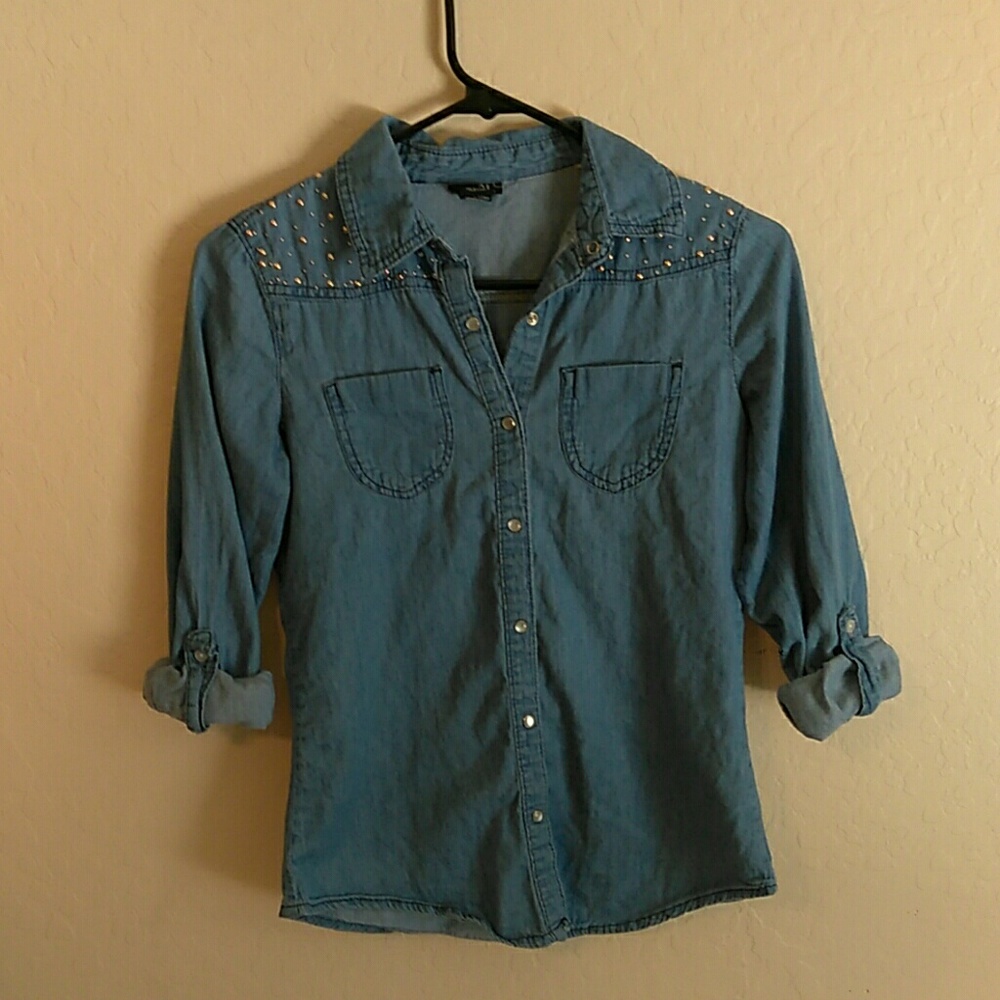 Blue jean style button up long sleeve shirt.