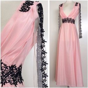 Blush satin ball gown with black accents