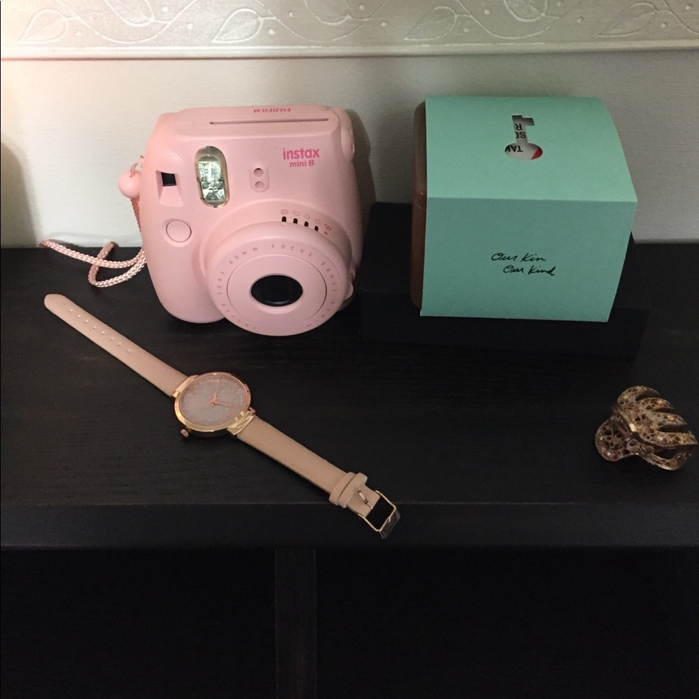 Pale pink watch with rose gold face