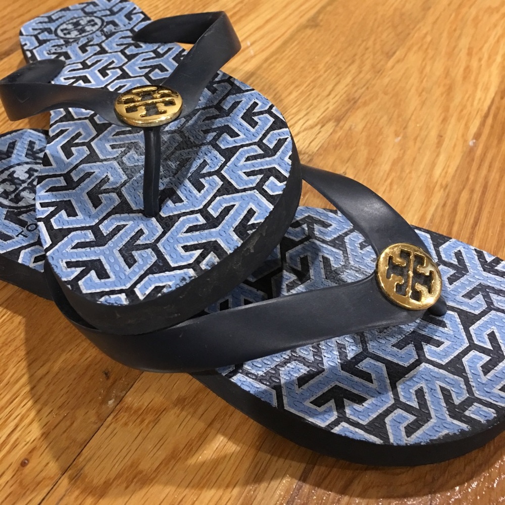 Tory Burch flip flops in navy blue and gold