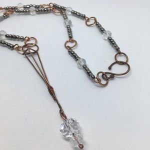 Handmade bronze geometric & hand beaded necklace.