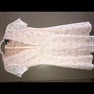 White dress with deep V lace detail