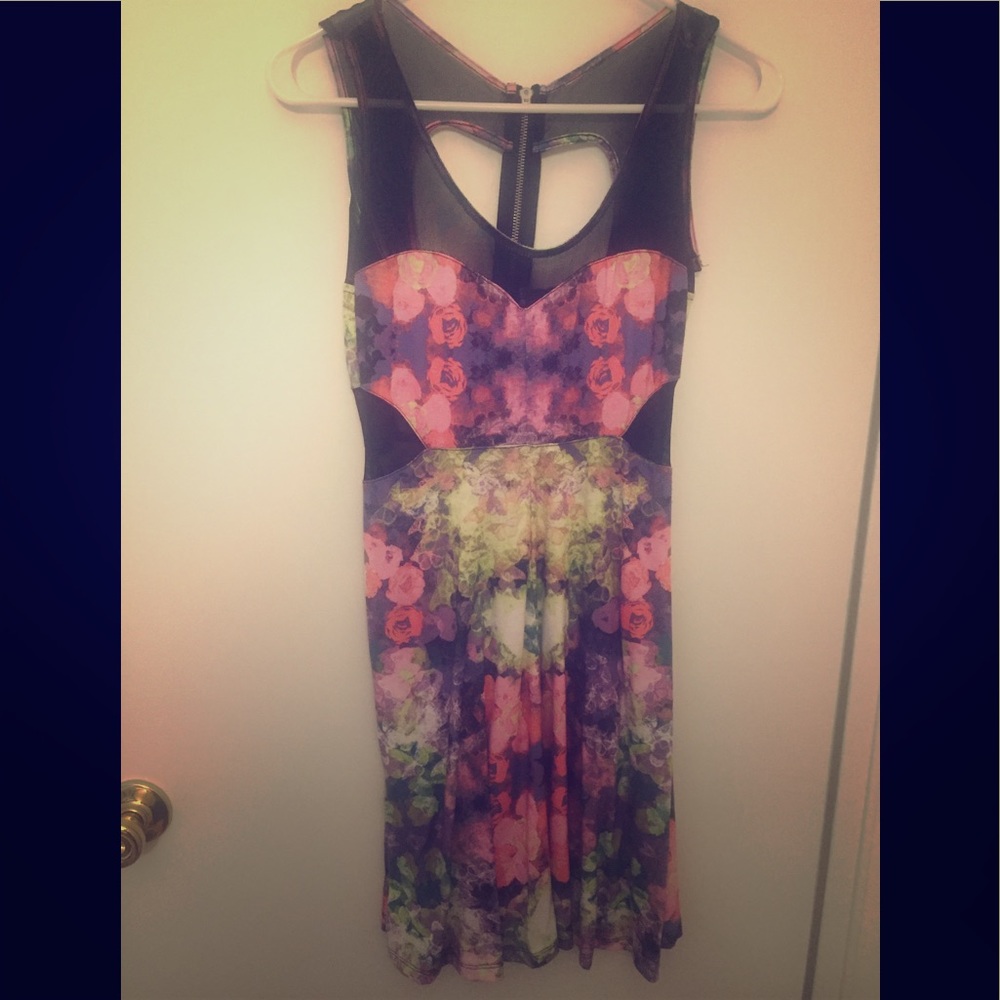 Printed Dress with black mesh panels.