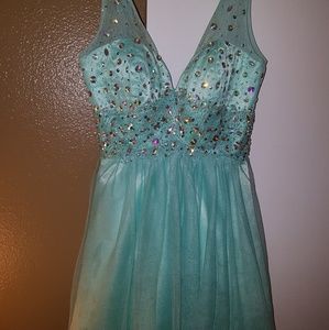 a turquoise aqua color dress