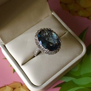 London Blue Topaz Oval Halo Ring