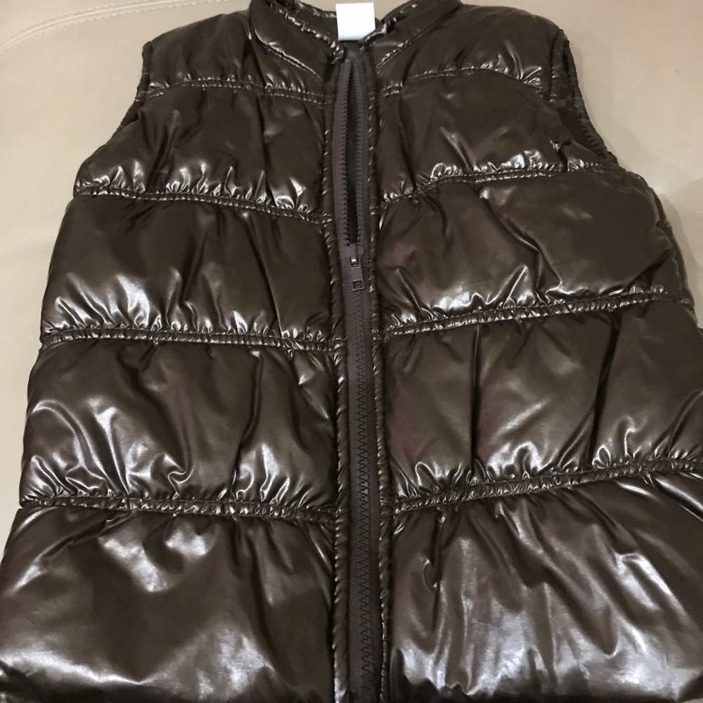 Brand new puffer vest in bronze