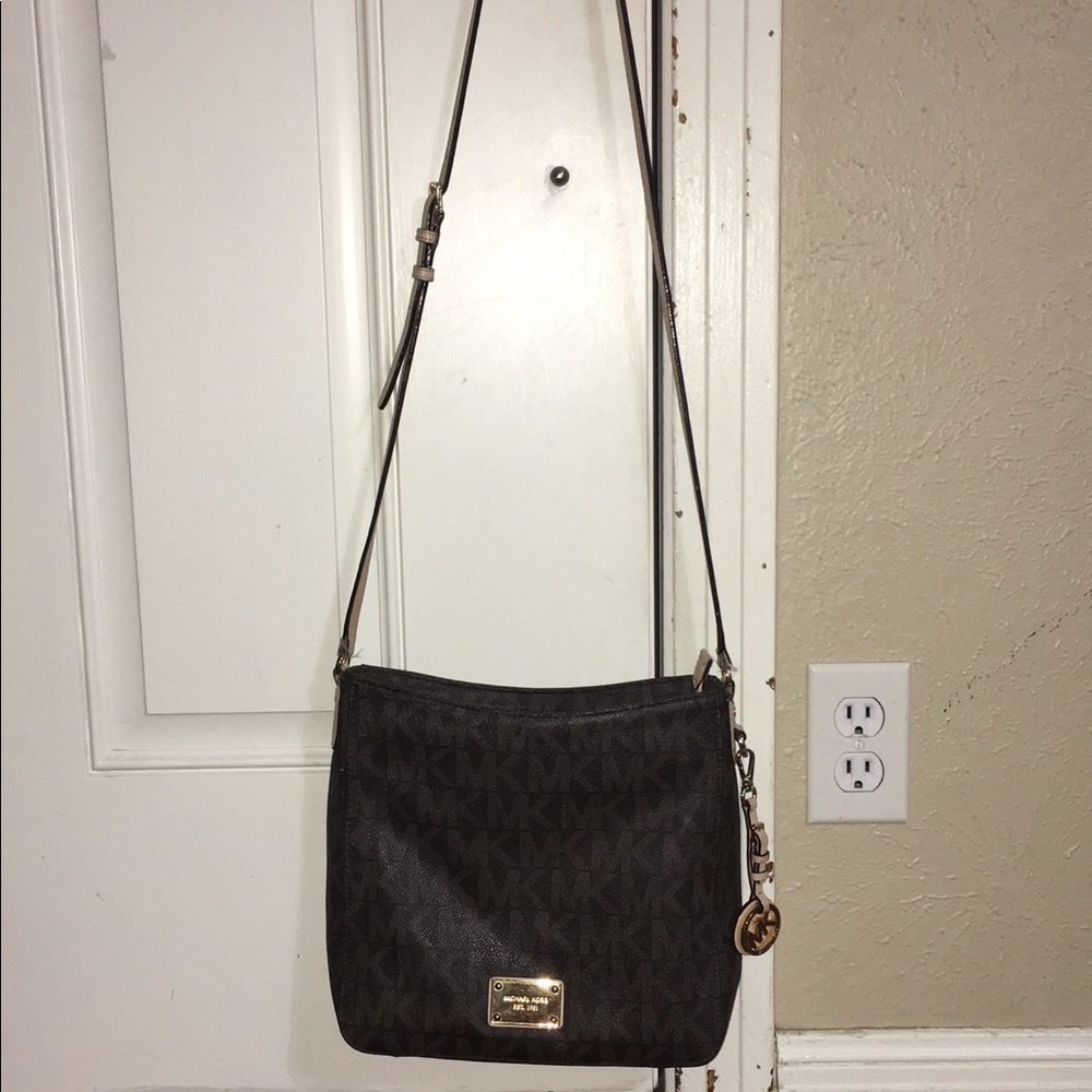 Barely Used MK Brown crossbody purse.