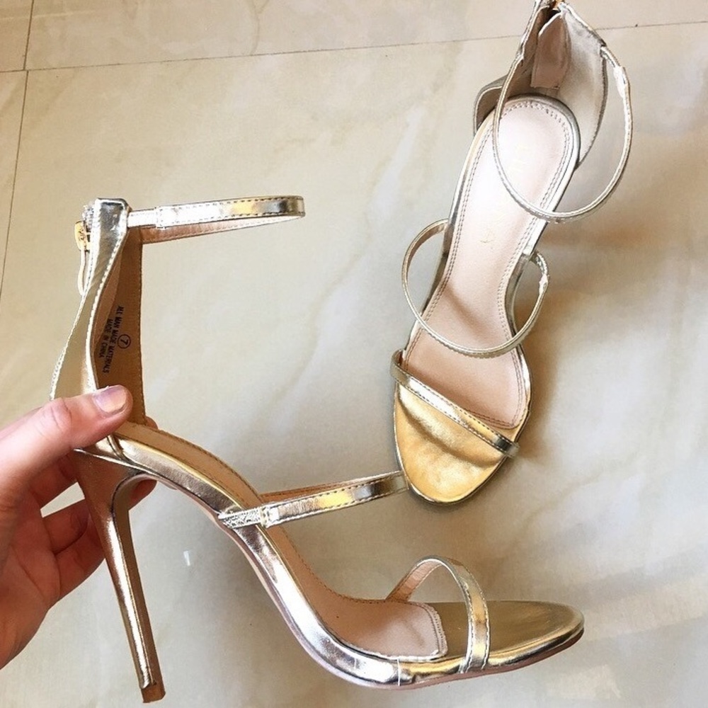 Three strap gold heels
