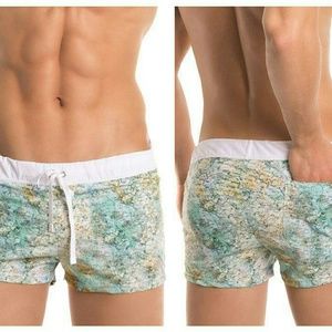 Arrecife Travel Print Swim Trunks