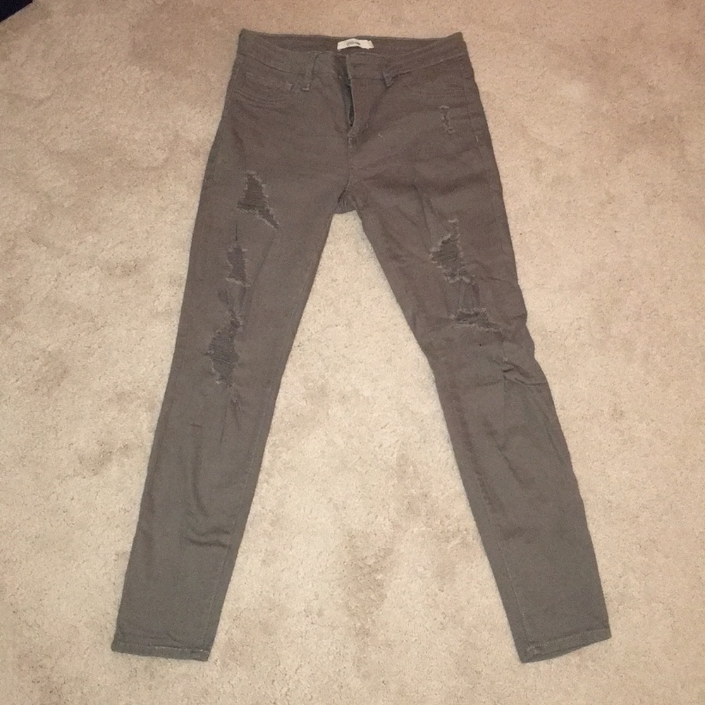 Army green ripped jeans