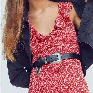 Metal tipped leather belt