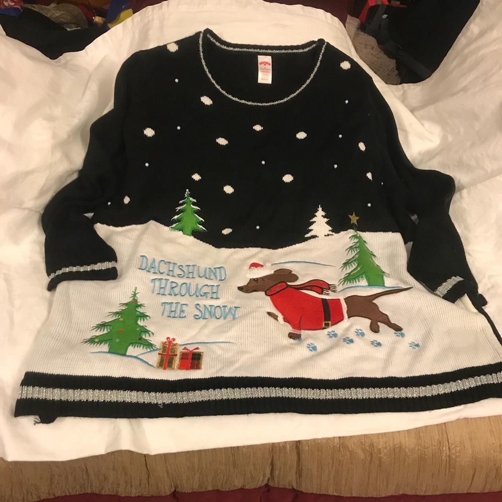 Christmas sweater with a dog dashing