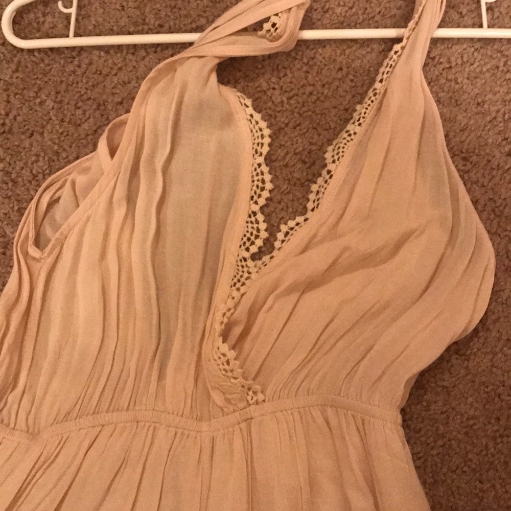 Light pink backless la hearts romper never worn!